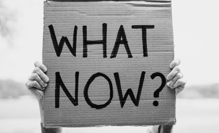 Atheist person looking annoyed while answering repetitive questions about their beliefs