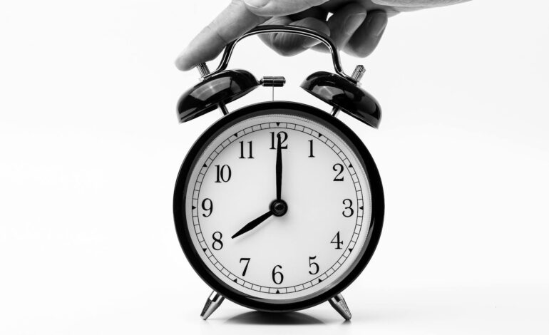 A radiant sunrise over a peaceful landscape, symbolizing spiritual awakening and the Second Coming as a metaphor for divine consciousness.