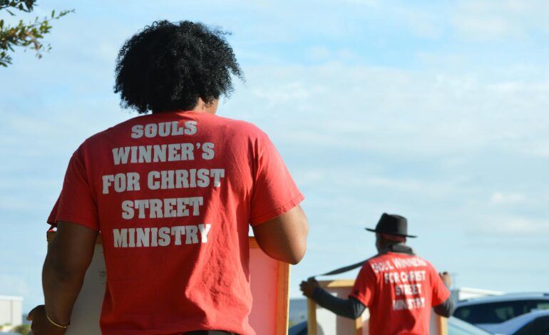 African village with colonial-era church building symbolizing economic exploitation through missionary work