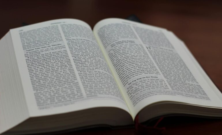 Ancient religious texts and symbols representing different faiths, illustrating the complex relationship between sacred scriptures and warfare throughout history